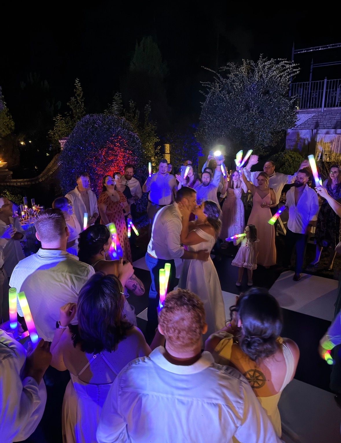 Bride and groom celebrating on a packed wedding dance floor with Good Vibrations Events, an Asheville wedding DJ and MC company Bride and groom celebrating on a packed wedding dance floor with Good Vibrations Events, an Asheville wedding DJ and MC company